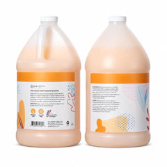 Ginger Lily Farms shampoo pouring from spout into dispenser for economical refill