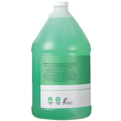 Ginger Lily Farms pouring refill into dispenser, highlights easy refill convenience