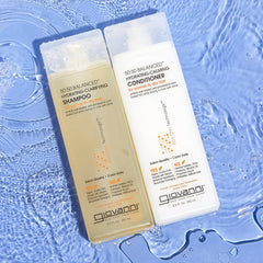 GIOVANNI bottles in a shower environment showing easy in-shower use and convenience