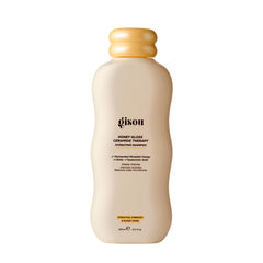 Gisou front bottle showing product label and glossy finish benefit