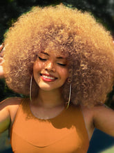 GKtineke blonde afro front view showing natural volume and realistic look