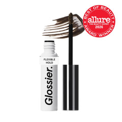 Glossier Boy Brow open tube with mini brush demonstrating precise application