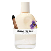 Glossier You Doux front packaging shows bottle and branding, suggesting elegant daily use