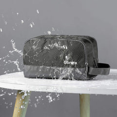 Gonex toiletry bag opened layout displaying compartments for bottles and small items