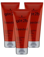 Hand holding Got2b Boosted 6 oz tube showing scale and convenience