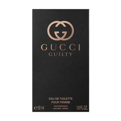 Gucci Guilty fragrance liquid close-up showing amber tone and warm scent appeal