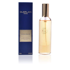 Guerlain Shalimar next to a ruler for true 93 ml size perspective