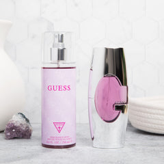 GUESS fragrance droplet close-up showing texture and vibrant top notes