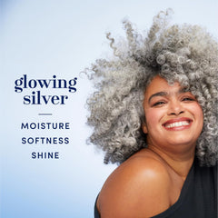 Hair Biology conditioner cream texture showing lightweight moisturizing effect
