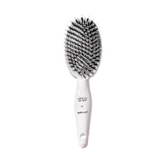 HAIRtamin front view of Miracle Brush showing paddle shape and polished finish benefit