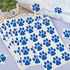 Harloon size comparison with coin showing compact paw dimensions for versatility