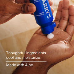 Applying Harry's balm to jawline, soothes and calms skin after shaving