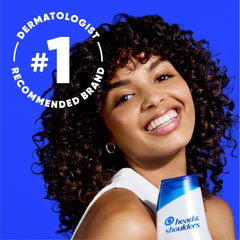 Head & Shoulders conditioner bottle close-up showing argan oil and rose essence benefits