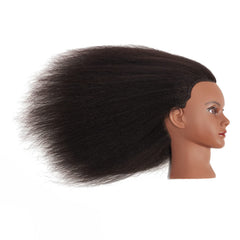 Headwinn mounted with table clamp showing stable setup for salon-style training