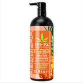 Hempz front bottle view showing full product and tropical scent benefit