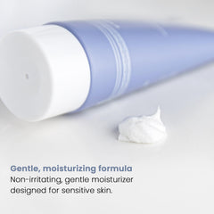Henson Shaving bottle in hand for scale, benefit: compact TSA-compliant size
