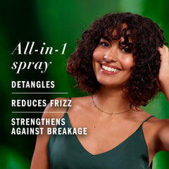 Herbal Essences nourishing spray mist in hand offering quick absorption