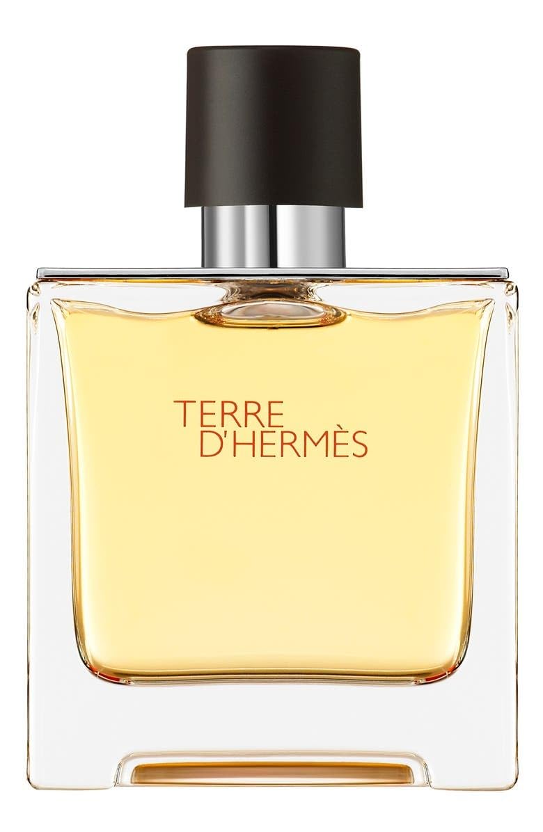 Hermès Terre d'Hermès front bottle showing elegant glass and warm color for refined presence