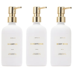 HOMCDALY front view of three white gold pump bottles for neat bathroom storage