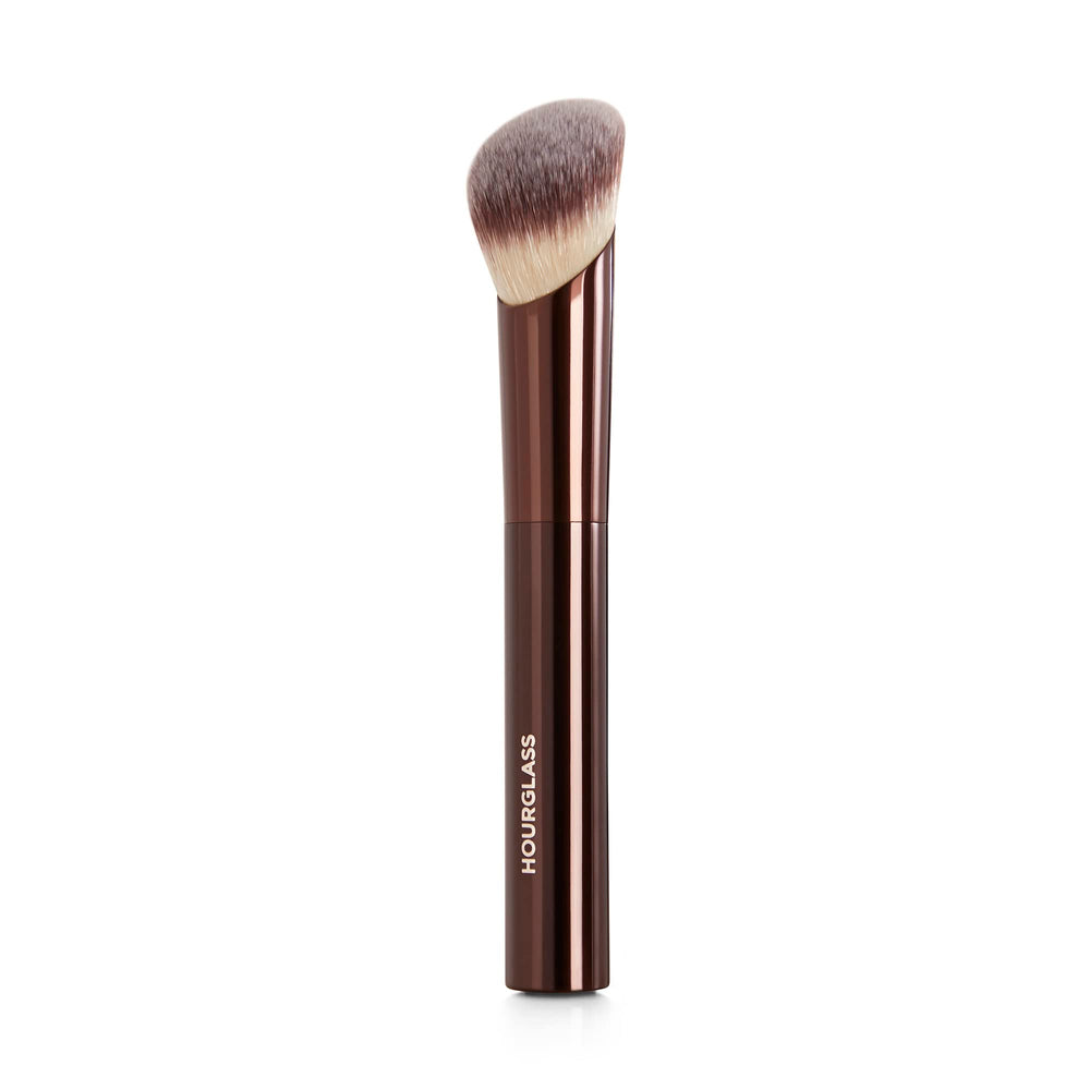 Hourglass brush front view showing angled head for precise application