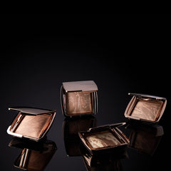 Hourglass bronzer marbled close-up highlighting unique handmade texture and glow