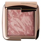 Hourglass compact front packaging showing sleek case and protective closure benefits portability