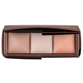 Hourglass front packaging showing three powders and sleek compact for travel