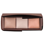 Hourglass front packaging showing three powders and sleek compact for travel