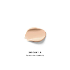 HOURGLASS concealer texture close-up showing smooth creamy finish benefit: soft-focus look