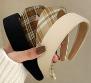 Huachi front view of four headbands showing colors and pack benefit