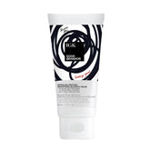 IGK travel tube front view showing compact smoothing balm for polished results