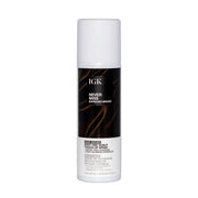 IGK front packaging of Never Miss spray showing product and shade benefits