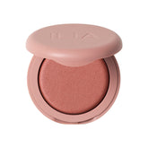 ILIA front compact showing clean packaging and travel-ready benefit