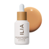 ILIA front packaging showing bottle and label, highlights clean formulation