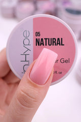 IN.HYPE gel applied on nail form illustrating clean extension shaping and strong apex