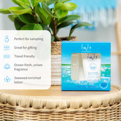 Inis duo beside a coin to illustrate compact travel-friendly size