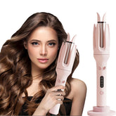 INK-EEZE front view of pink automatic curling iron showing compact design and ergonomic handle for faster styling