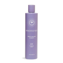 INNERSENSE bottle front packaging showing violet-toning shampoo benefits