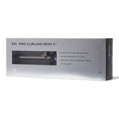 ion titanium pro curling iron in use on long hair demonstrating tight curls and travel-ready convenience