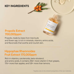 IUNIK bottle beside sea buckthorn berries emphasizing vitamin-rich formula