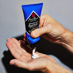 Jack Black applied to hands in use, softens calluses and cuticles quickly