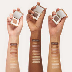 jane iredale compact nestled in a makeup bag for travel-friendly, on-the-go touch-ups