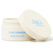 Jeff's Barbershop front jar showing sandalwood clay pomade label and matte finish