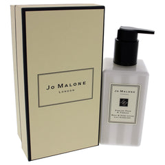 Jo Malone 8.5 oz bottle next to hand for scale and travel-friendly benefit