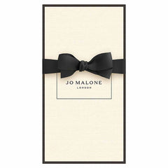 Jo Malone lotion texture on hand showing smooth, fast-absorbing formula