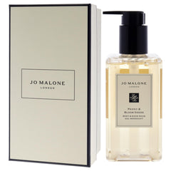 Jo Malone bottle beside bath with towel showing luxurious daily ritual