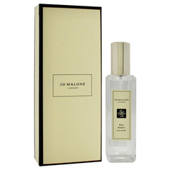 Jo Malone spray in hand demonstrating easy application and portable convenience