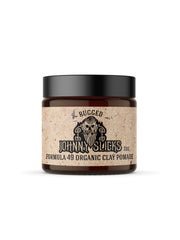 Johnny Slicks front jar view highlighting strong hold and organic formula