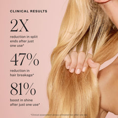 JVN being applied to wet hair in shower for quick one-minute treatment benefit