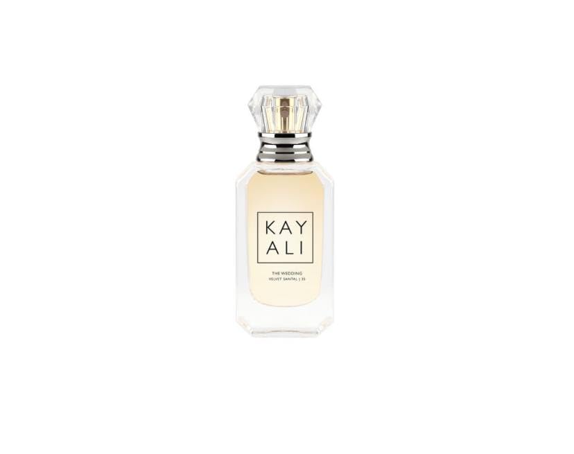 KAYALI travel spray front packaging showing compact bottle and elegant styling for on-the-go use